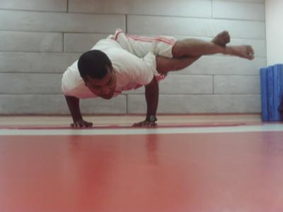 Yogi Akhilesh Performing Ashtavakra Asana